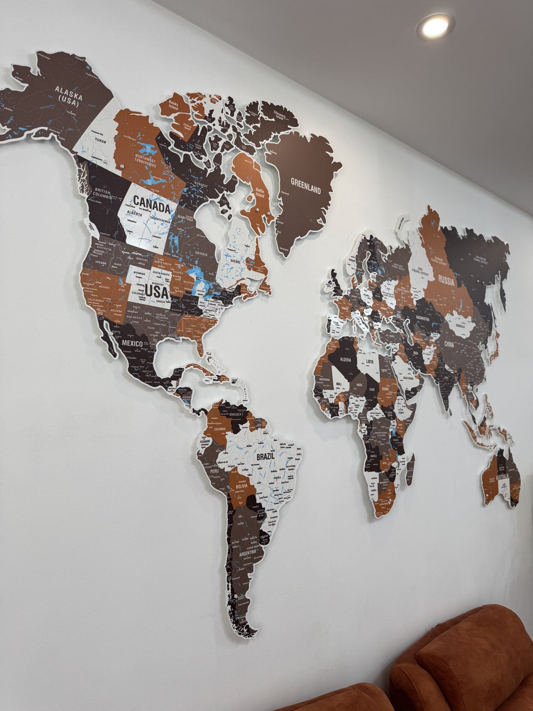 Exclusive Metal World Map Wall Decor - UV Print Wall Art (Soil) in a customer's home