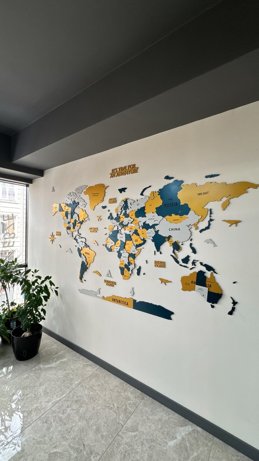 Wood Map - Large Wooden World Map Wall Art for Living Room in a customer's home