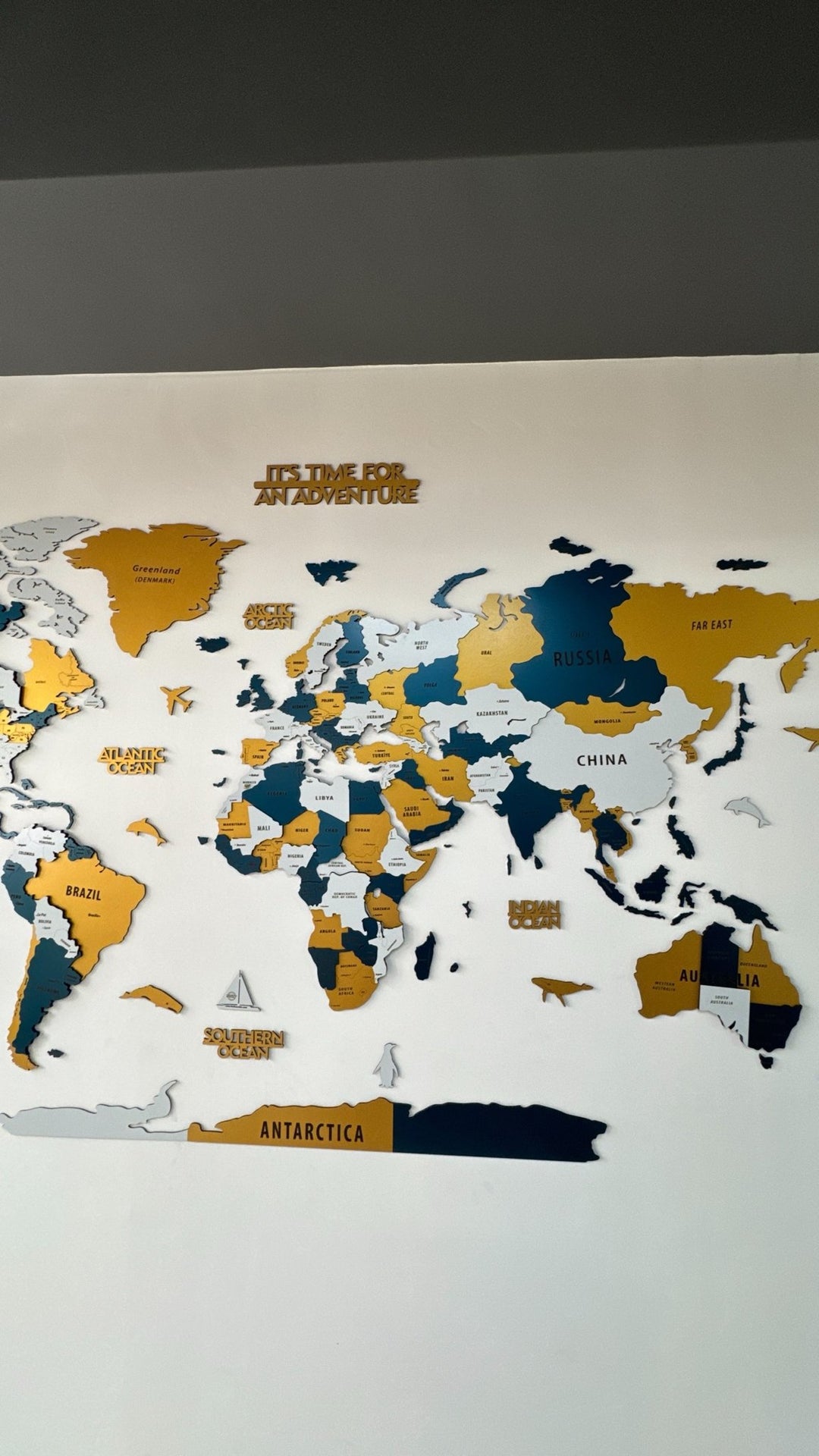 Wood Map - Large Wooden World Map Wall Art for Living Room in a customer's home