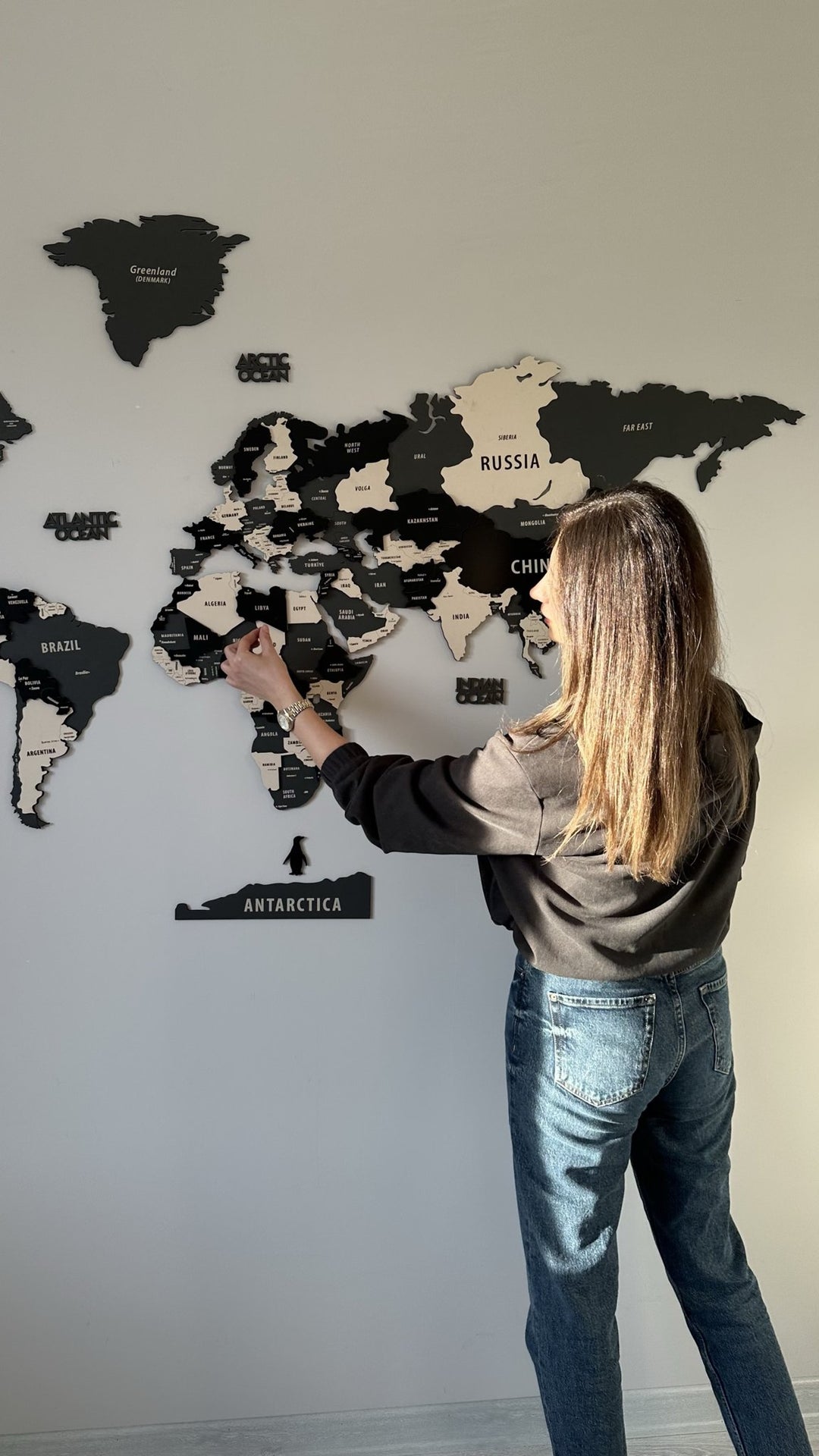 Wood Map Living Room Wall Decor - World Map Wall Art in a customer's home