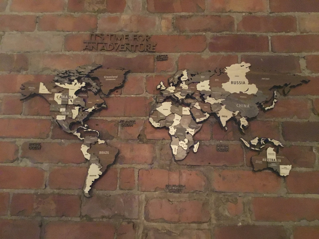 Wooden World Map Puzzle - 3d Wood Push Pin Maps, Wooden on Metal in a customer's home