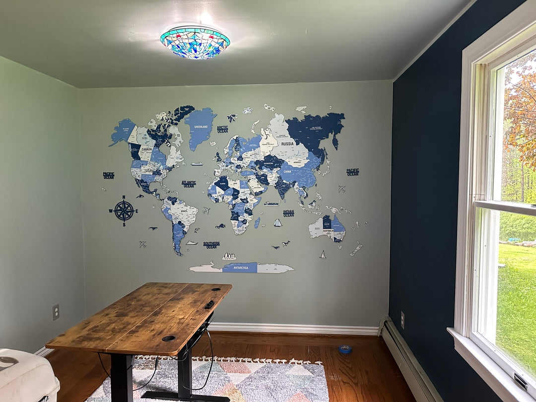 Wooden World Map with Pins - 3D & Vibrant Colors (Navy) in a customer's home