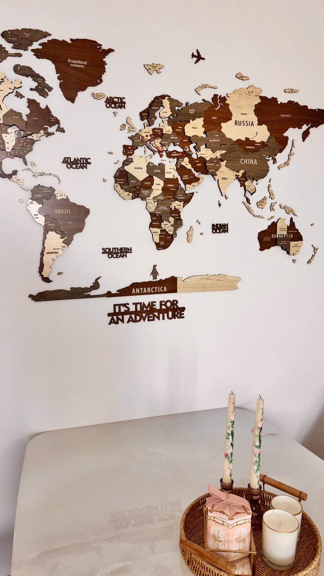 Wooden World Map Wall Art - 3d Wood Push Pin Maps, Multicolor in a customer's home