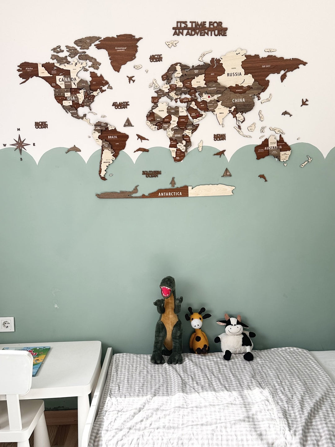 Wooden World Map Wall Art - 3d Wood Push Pin Maps, Multicolor in a customer's home