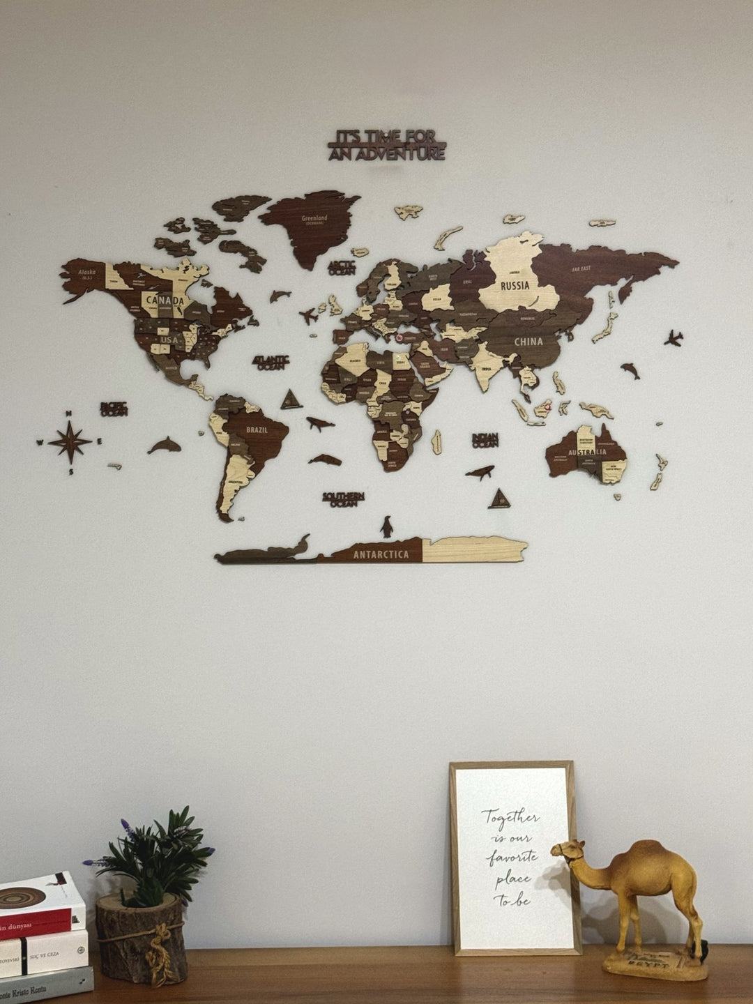Wooden World Map Wall Art - 3d Wood Push Pin Maps, Multicolor in a customer's home