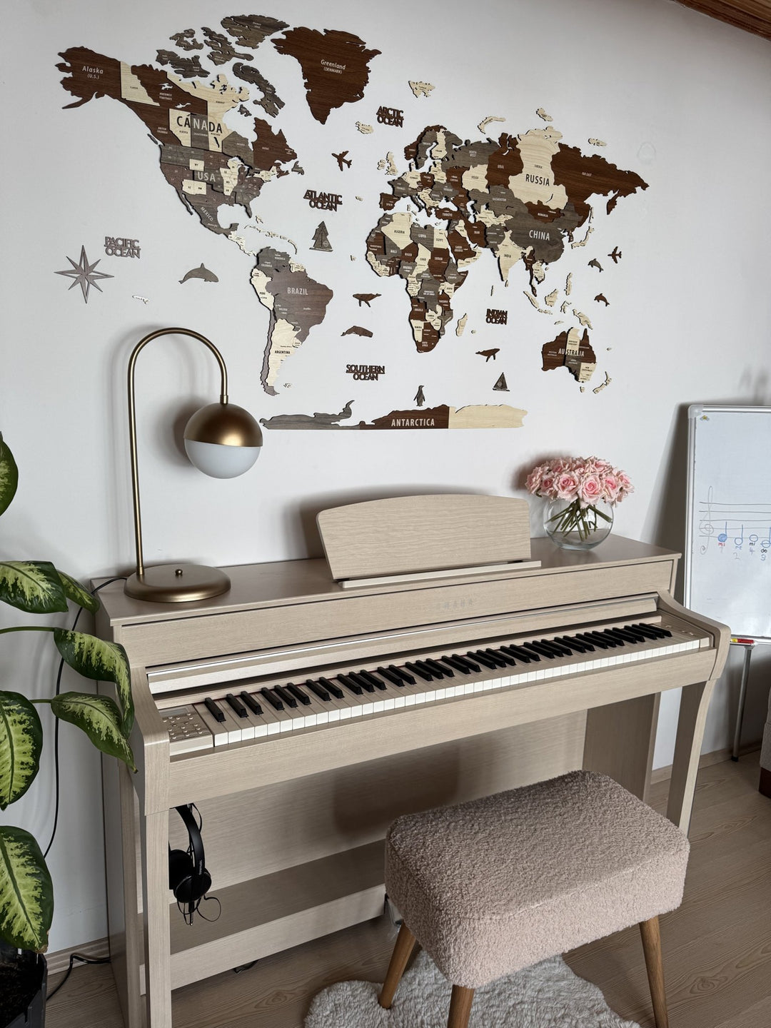 Wooden World Map Wall Art - 3d Wood Push Pin Maps, Multicolor in a customer's home