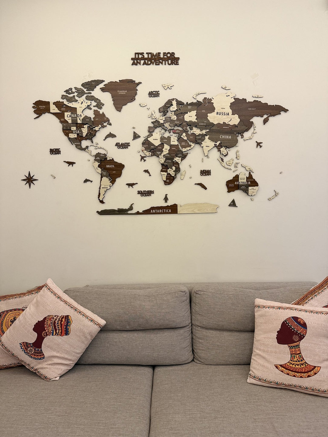 Wooden World Map Wall Art - 3d Wood Push Pin Maps, Multicolor in a customer's home