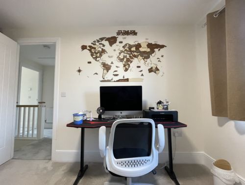 Wooden World Map Wall Art - 3d Wood Push Pin Maps, Multicolor in a customer's home