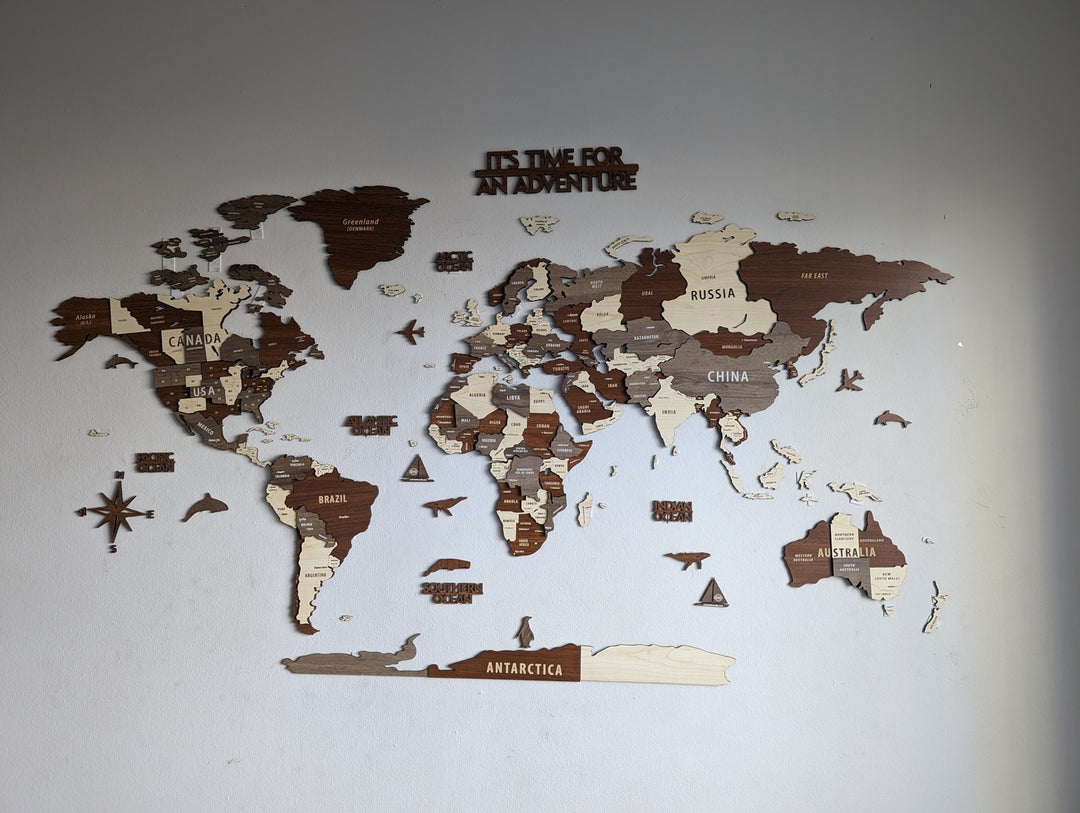 Wooden World Map Wall Art - 3d Wood Push Pin Maps, Multicolor in a customer's home