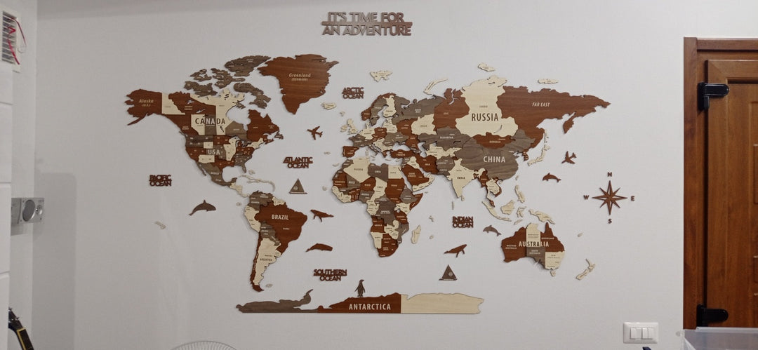 Wooden World Map Wall Art - 3d Wood Push Pin Maps, Multicolor in a customer's home