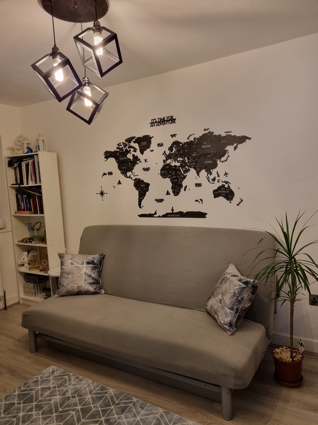 Wooden World Map Wall Art - 3d Wood Push Pin Maps, Multicolor in a customer's home