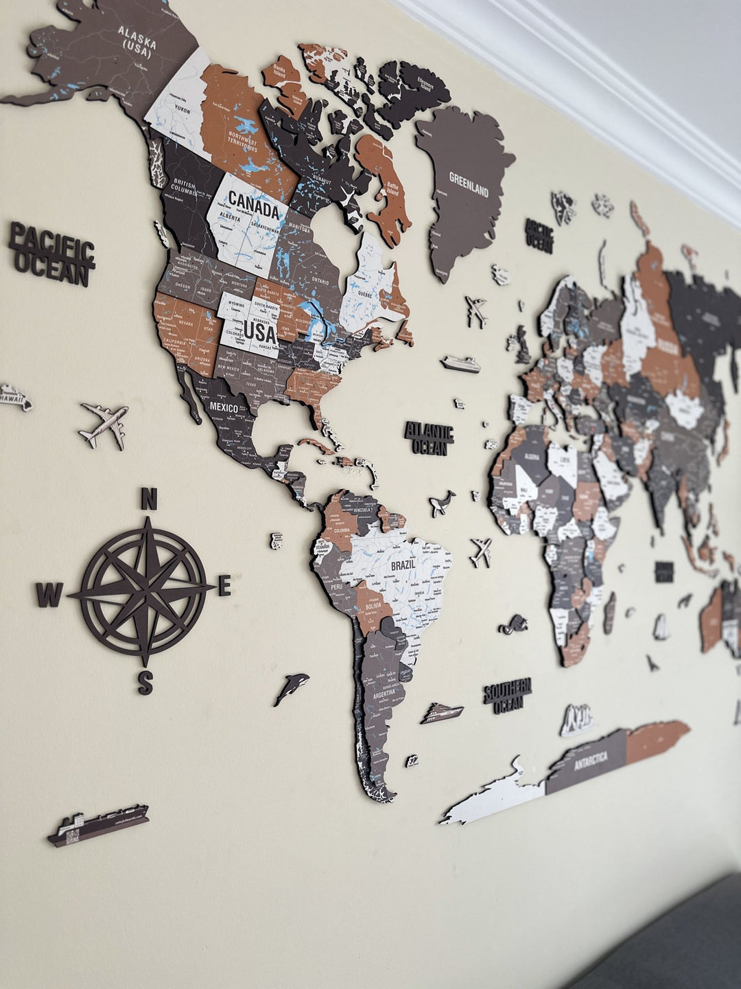 Wooden World Map Wall Art - UV Print, 3D Map with Vibrant Colors (Soil) in a customer's home