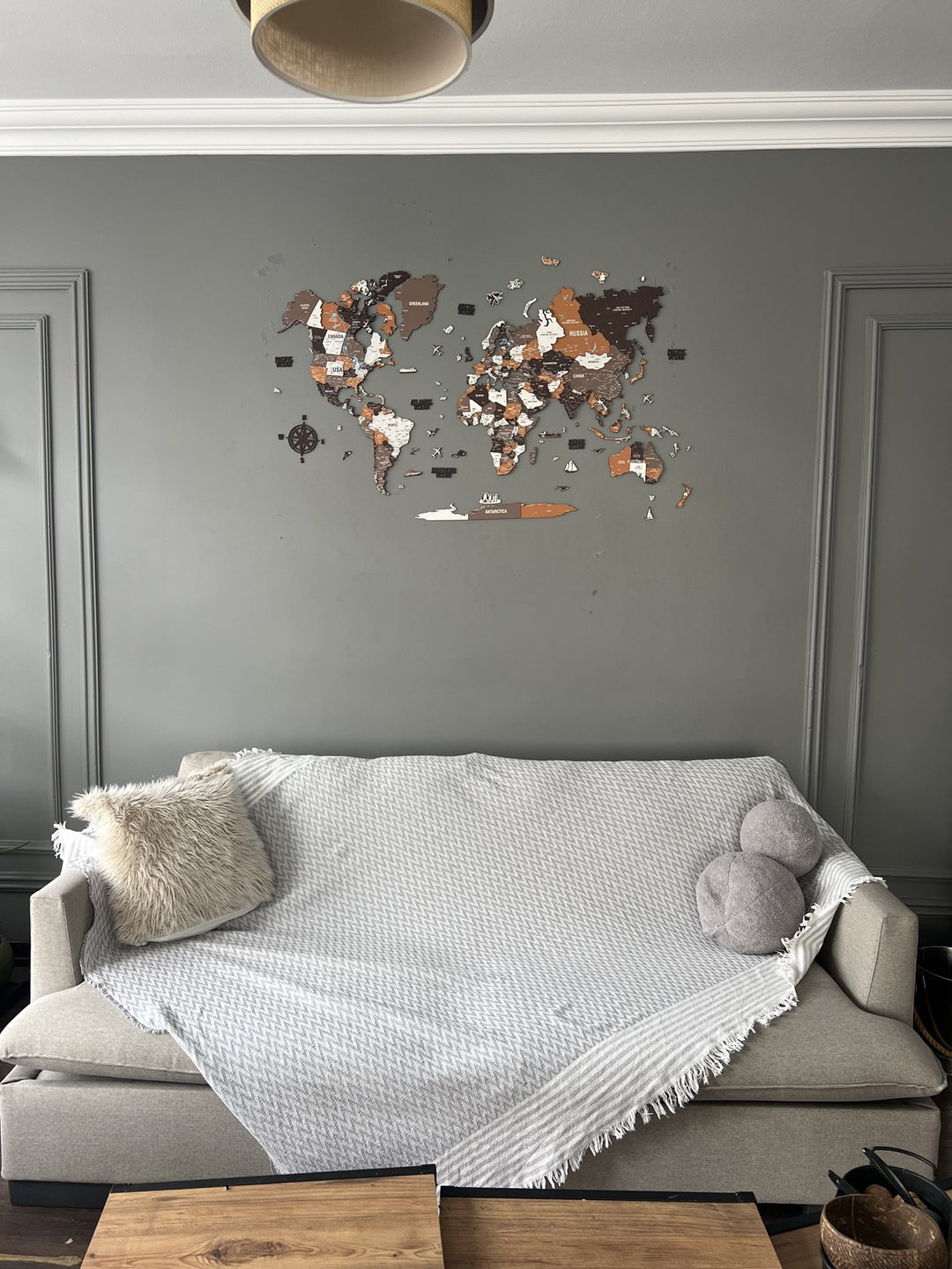 Wooden World Map Wall Art - UV Print, 3D Map with Vibrant Colors (Soil) in a customer's home