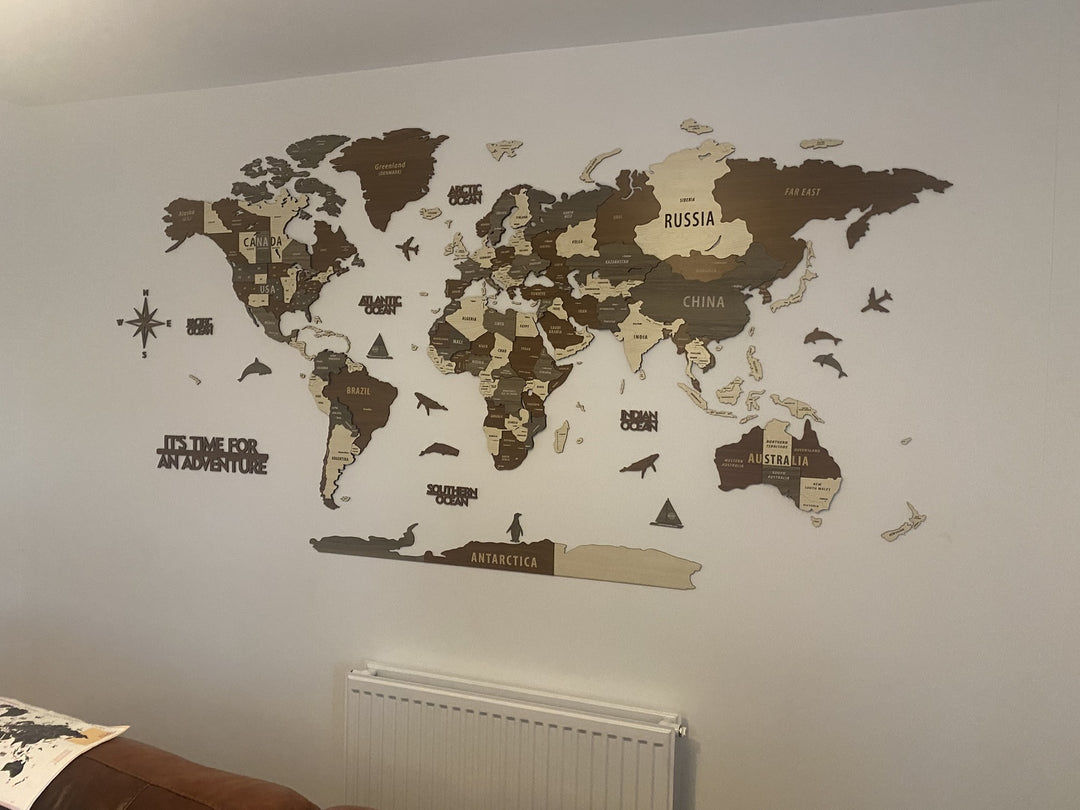 Wooden World Map Wall Art - 3d Wood Push Pin Maps, Multicolor in a customer's home