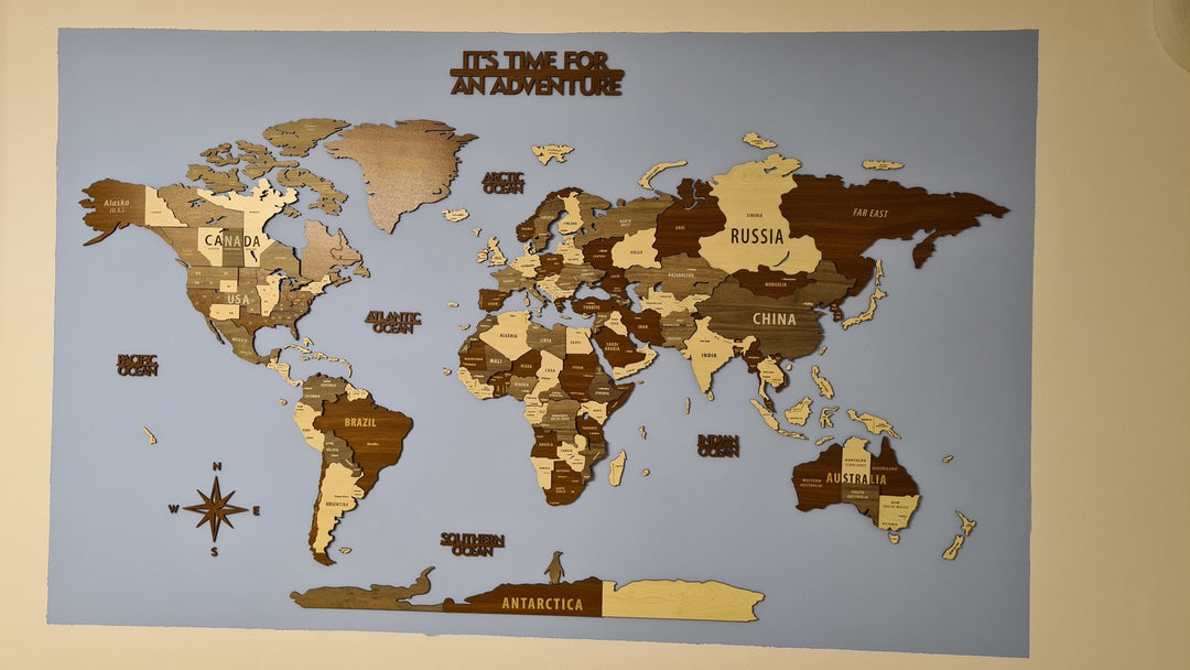 Wooden World Map Wall Art - 3d Wood Push Pin Maps, Multicolor in a customer's home