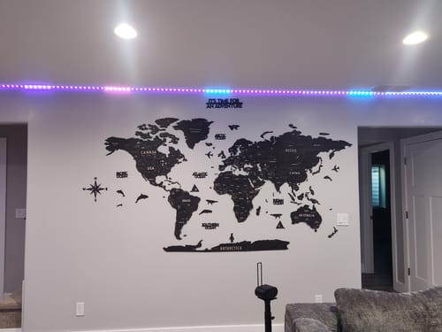 Wooden World Map with States - Push Pin 3D World Maps, Tuana Wood Wall Art in a customer's home