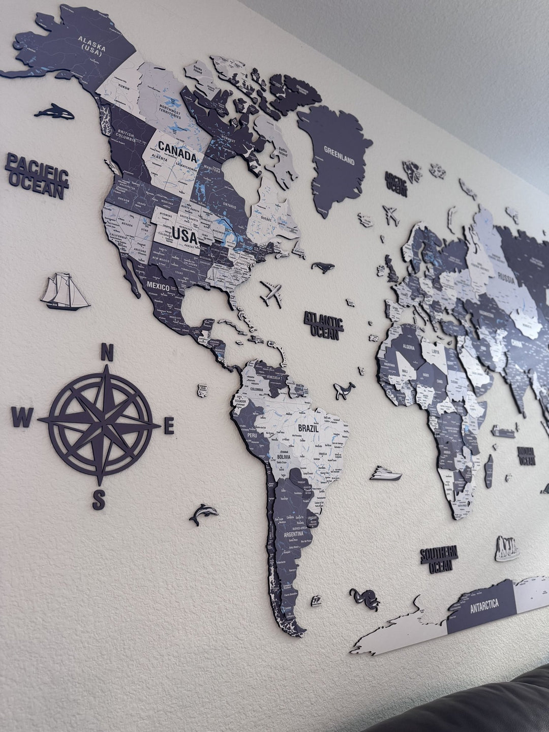 Wooden World Map for Wall - 3D Art & Vibrant Colors (Nimbus) in a customer's home