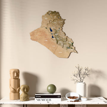 Satellite Iraq wooden wall map above a marble console, front view