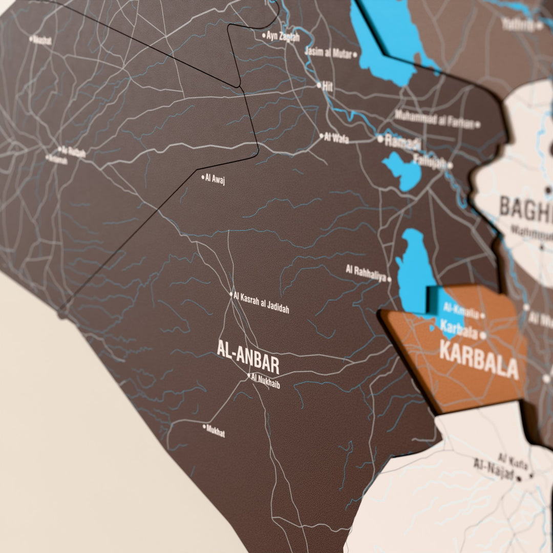 Close-up of the Soil Iraq wooden wall map with layered regions and printed names
