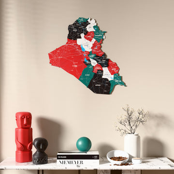 Flag colored Iraq wooden wall map above a marble console, front view