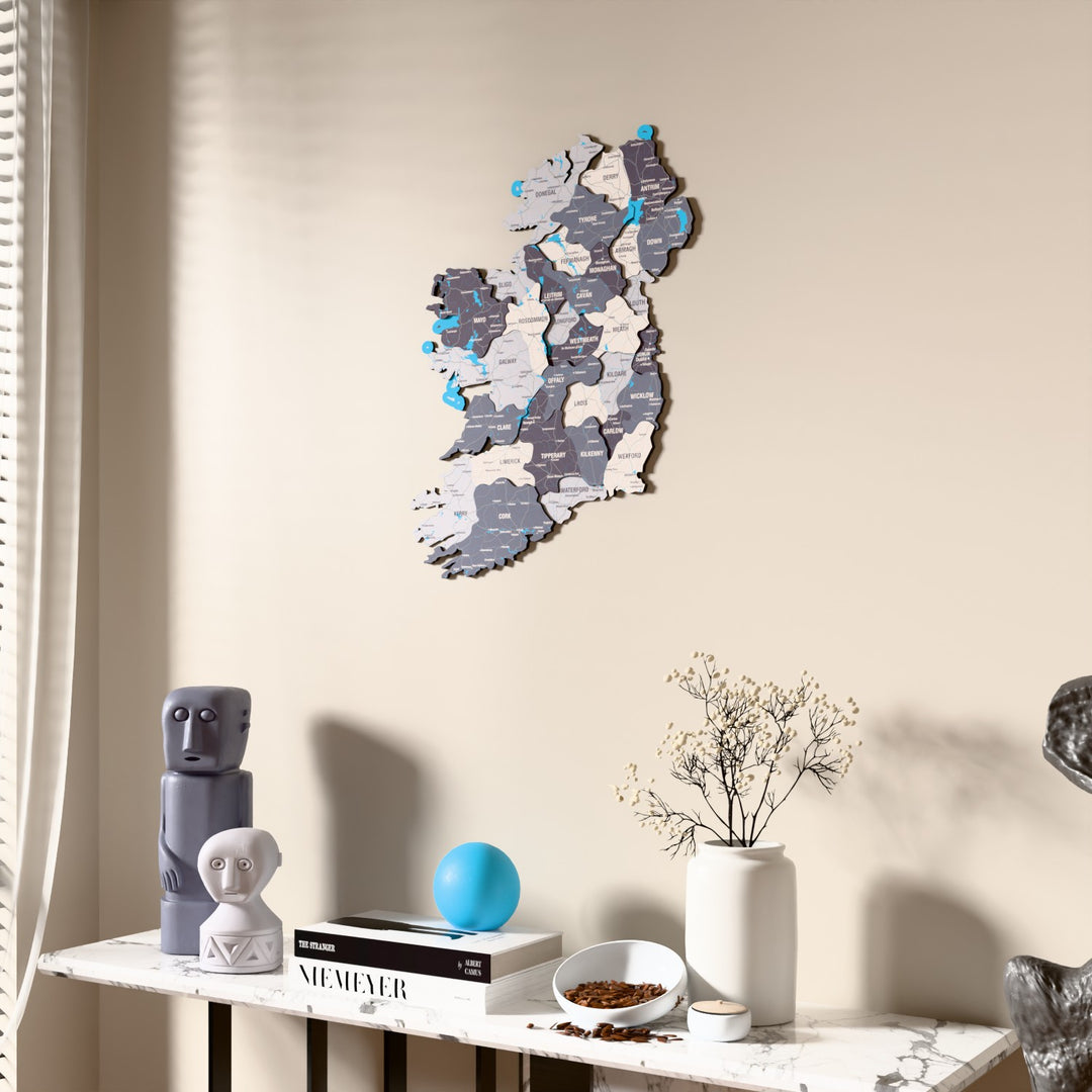 Nimbus Ireland wooden wall map beside a sheer curtain, angled view