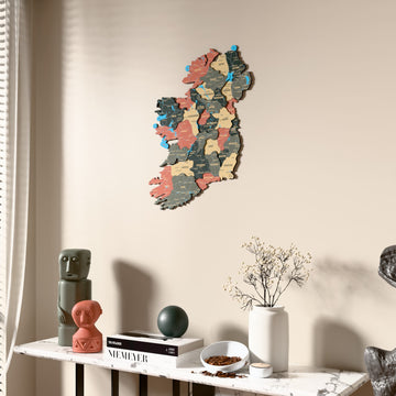 Sage Ireland wooden wall map beside a sheer curtain, angled view