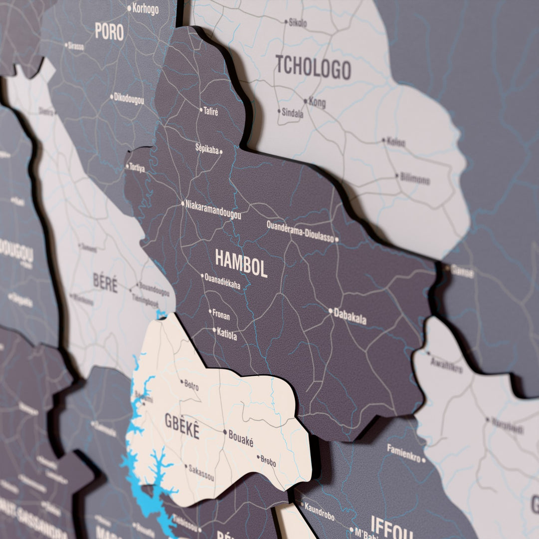 Close-up of the Nimbus Ivory Coast wooden wall map with layered regions and printed names