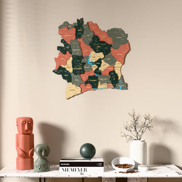 Sage Ivory Coast wooden wall map above a marble console, front view