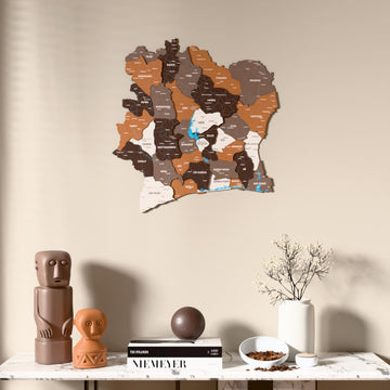 Soil Ivory Coast wooden wall map above a marble console, front view