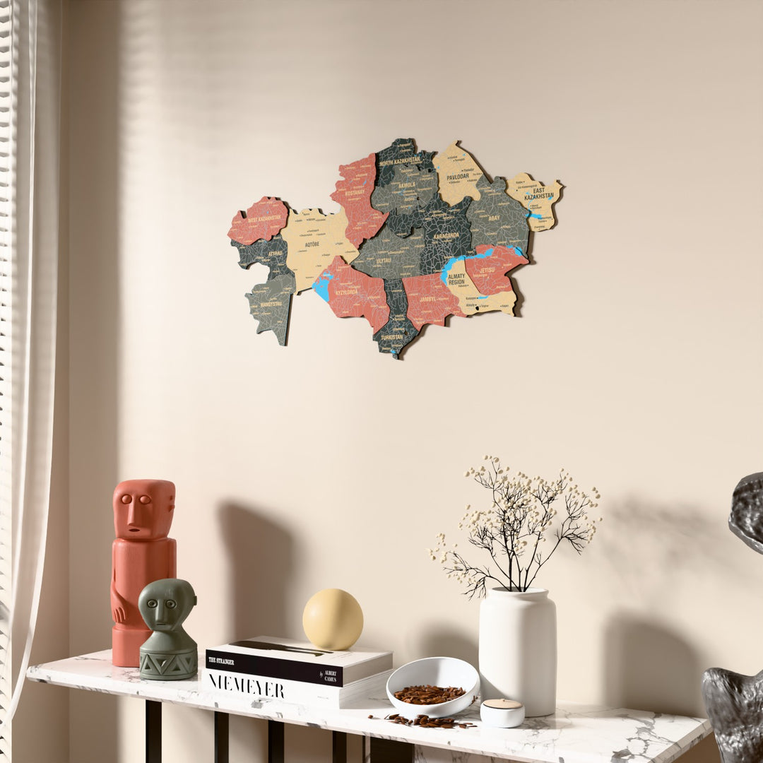 Sage Kazakhstan wooden wall map beside a sheer curtain, angled view