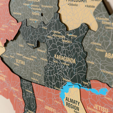 Close-up of the Sage Kazakhstan wooden wall map with layered regions and printed names