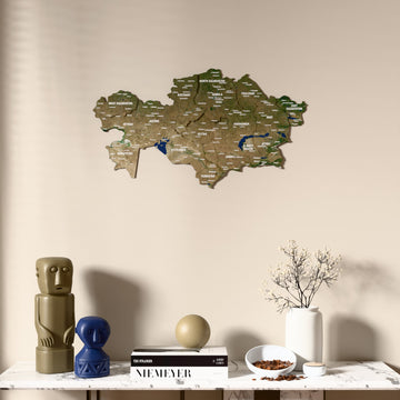 Satellite Kazakhstan wooden wall map above a marble console, front view