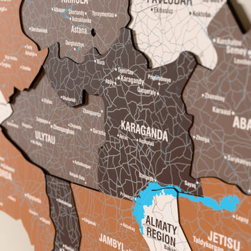 Close-up of the Soil Kazakhstan wooden wall map with layered regions and printed names