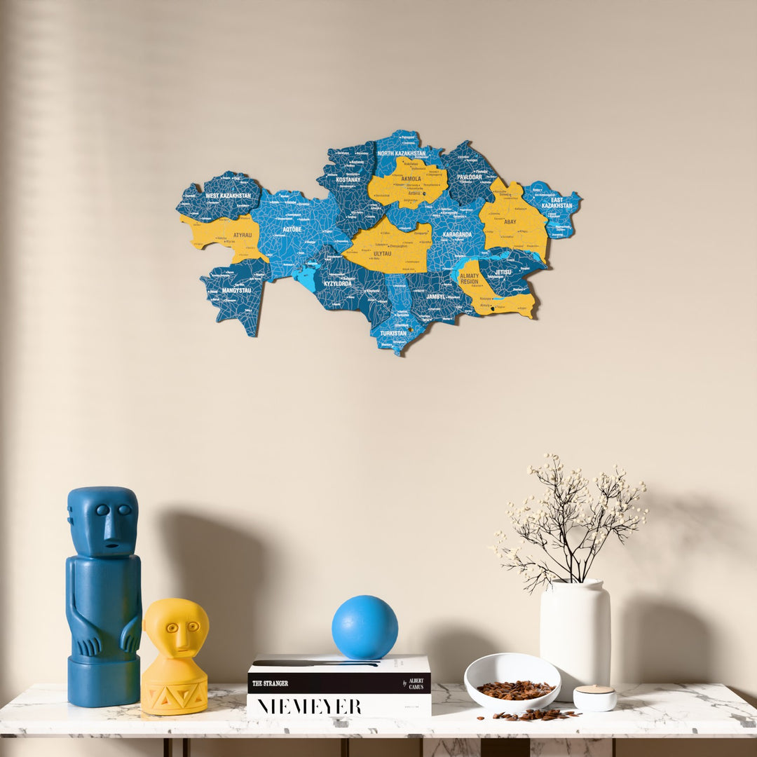 Flag colored Kazakhstan wooden wall map above a marble console, front view