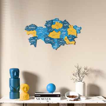 Flag colored Kazakhstan wooden wall map above a marble console, front view