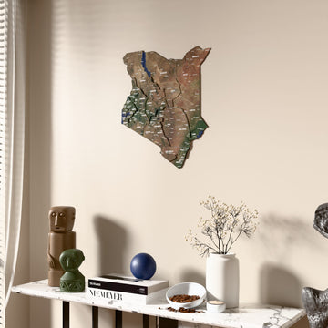 Satellite Kenya wooden wall map beside a sheer curtain, angled view