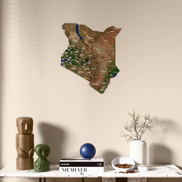 Satellite Kenya wooden wall map above a marble console, front view