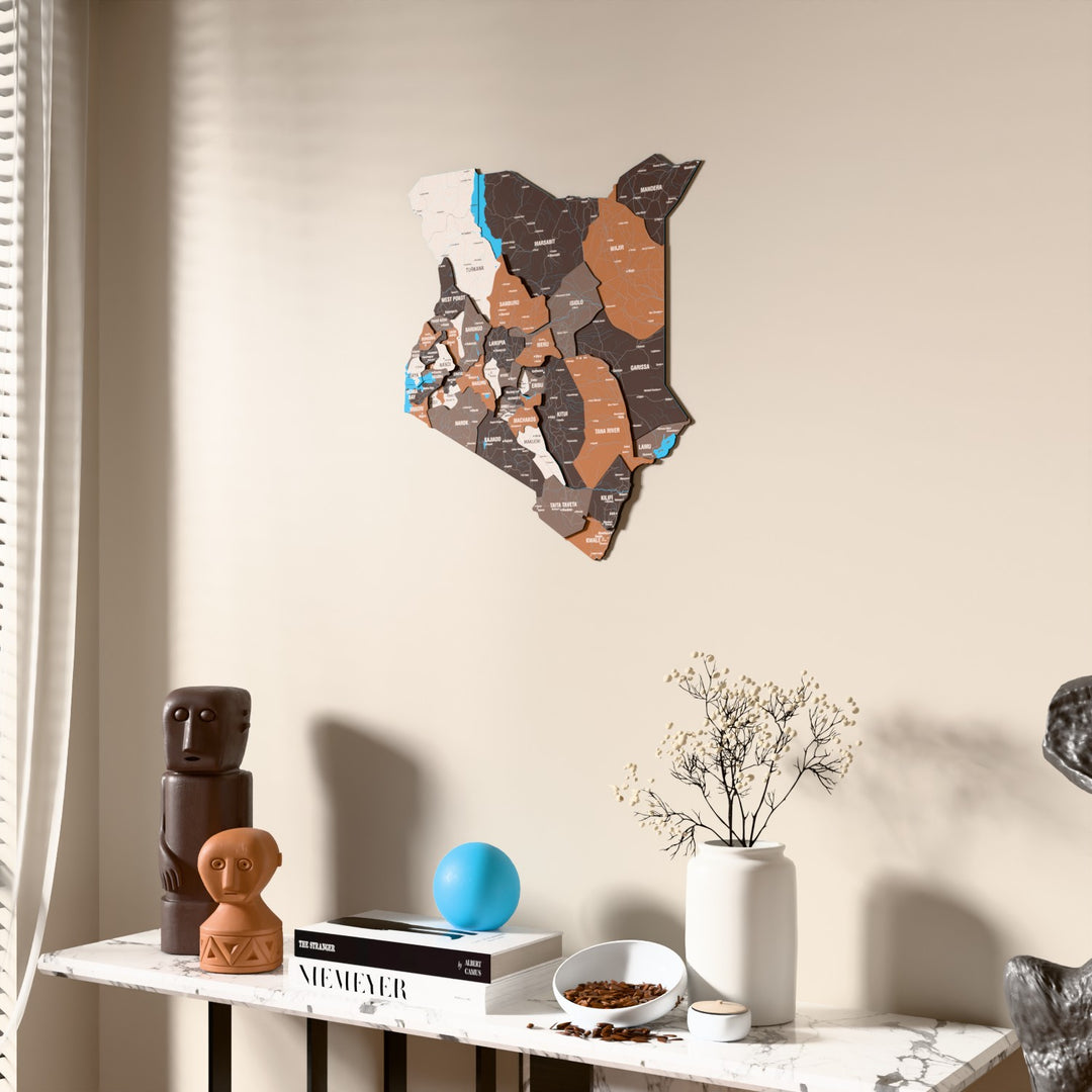 Soil Kenya wooden wall map beside a sheer curtain, angled view