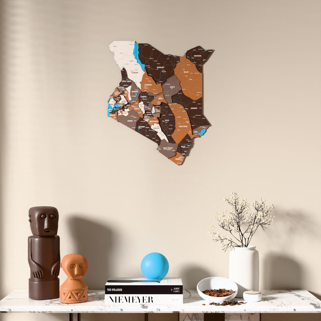 Soil Kenya wooden wall map above a marble console, front view