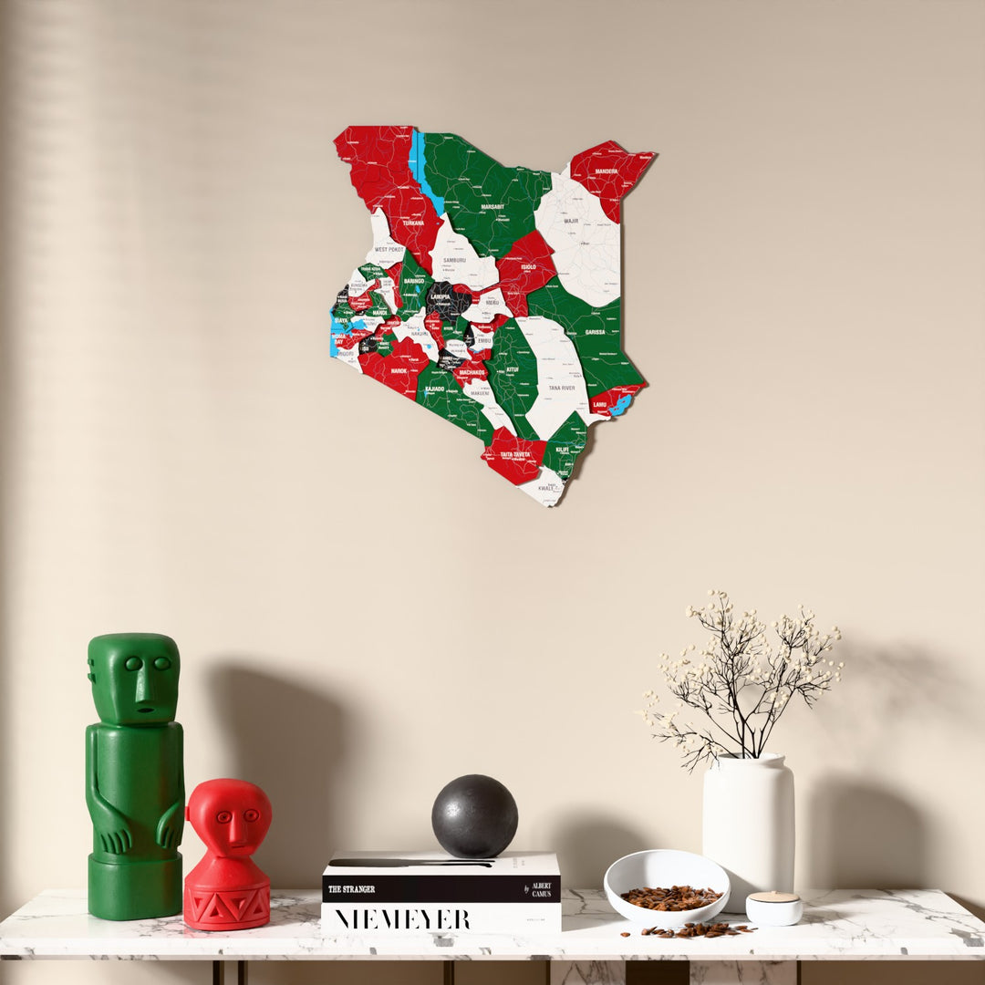 Flag colored Kenya wooden wall map above a marble console, front view