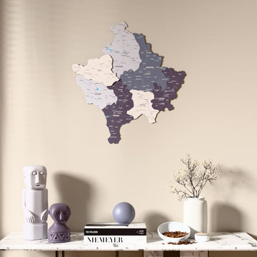 Nimbus Kosovo wooden wall map above a marble console, front view