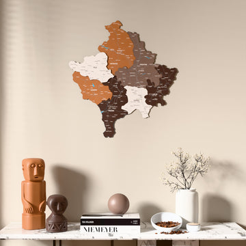 Soil Kosovo wooden wall map above a marble console, front view