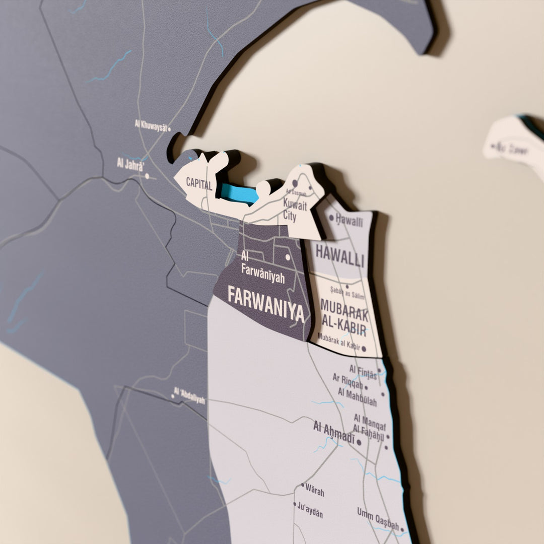 Close-up of the Nimbus Kuwait wooden wall map with layered regions and printed names