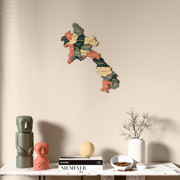 Sage Laos wooden wall map above a marble console, front view
