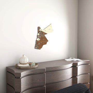Jordan wooden wall map hung on a white wall above a wooden console, small in the wide room view