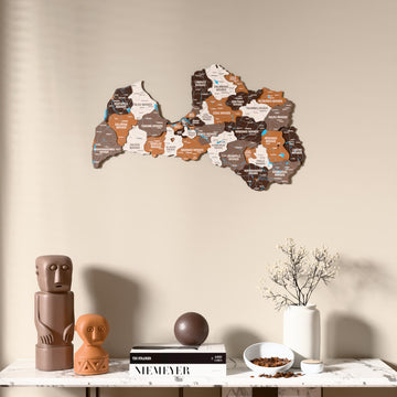 Soil Latvia wooden wall map above a marble console, front view