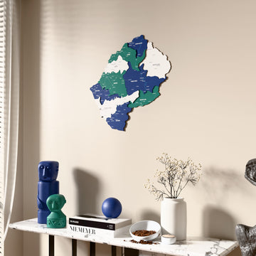 Flag colored Lesotho wooden wall map beside a sheer curtain, angled view