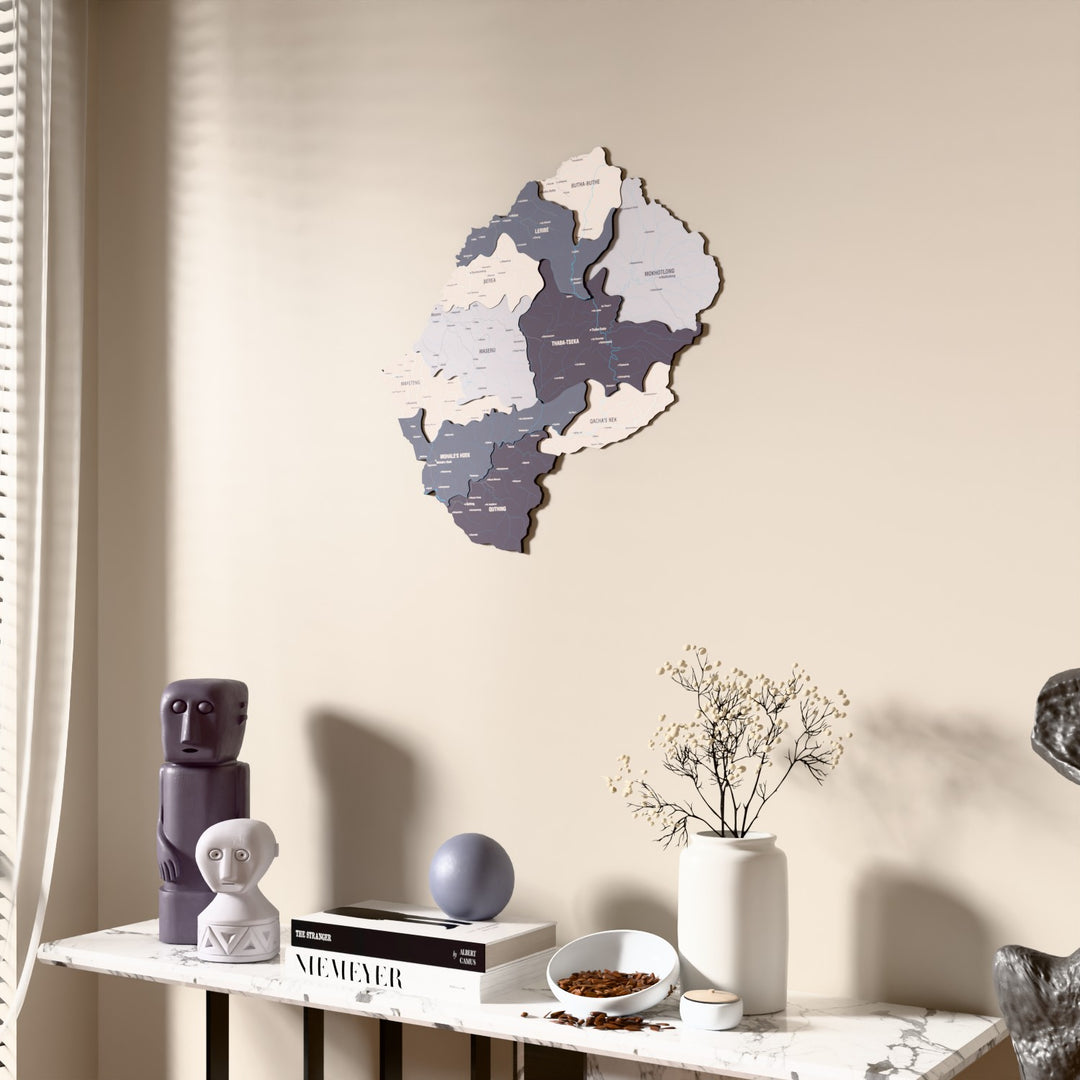 Nimbus Lesotho wooden wall map beside a sheer curtain, angled view