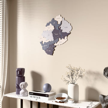 Nimbus Lesotho wooden wall map beside a sheer curtain, angled view