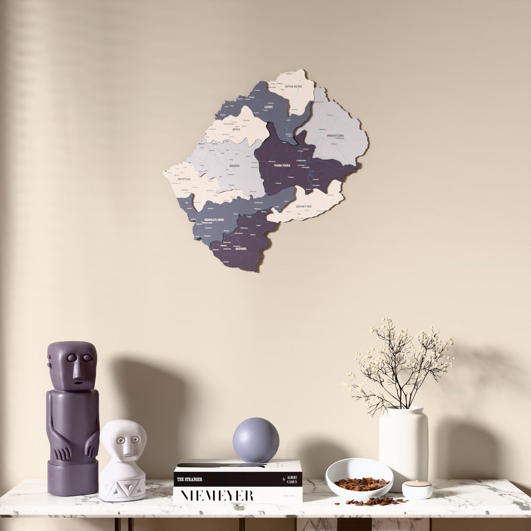 Nimbus Lesotho wooden wall map above a marble console, front view